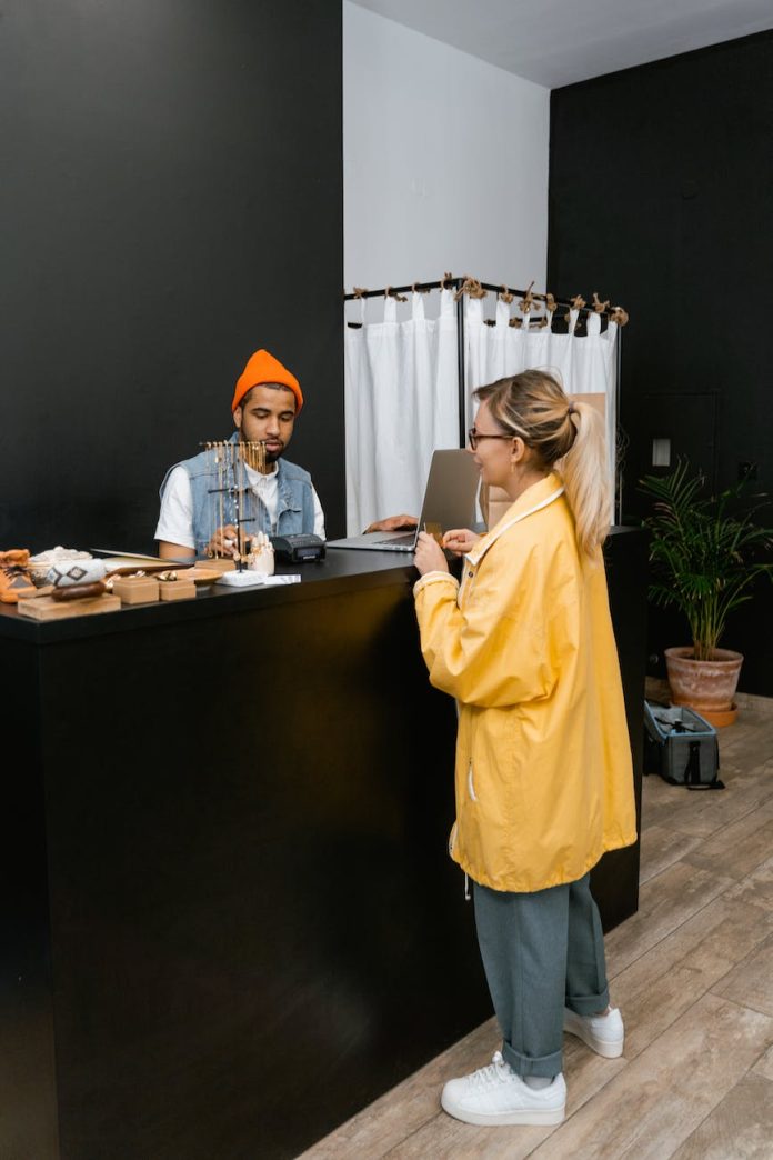 woman making payment through credit card