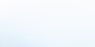 What is Cryptocurrency Lending? close up shot of two people holding a gold coin